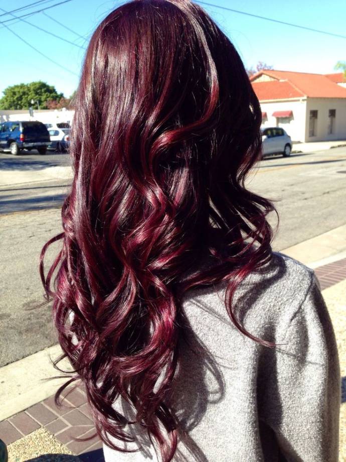 Long dark hair with plum highlights