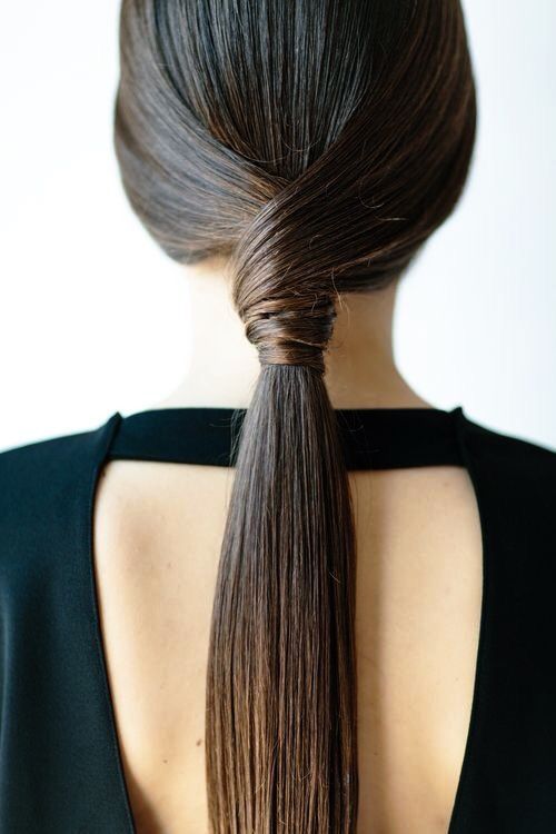 Sleek knotted hairstyle