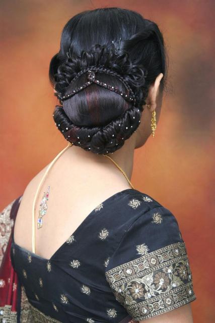 Low bun with decorative hair accessory