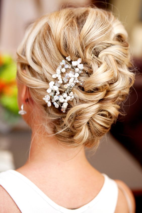 Messy french side bun with hair accessory