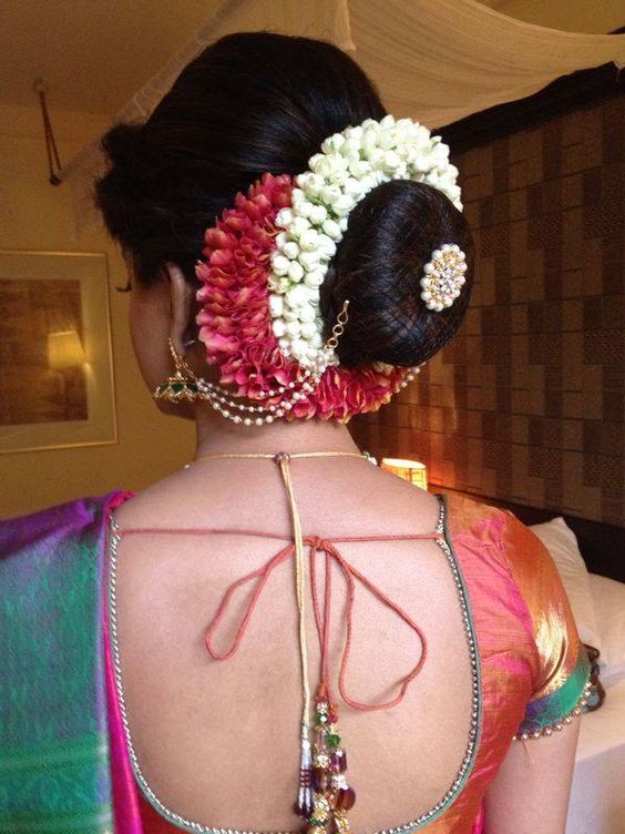 Bun with multiple floral gajra and net