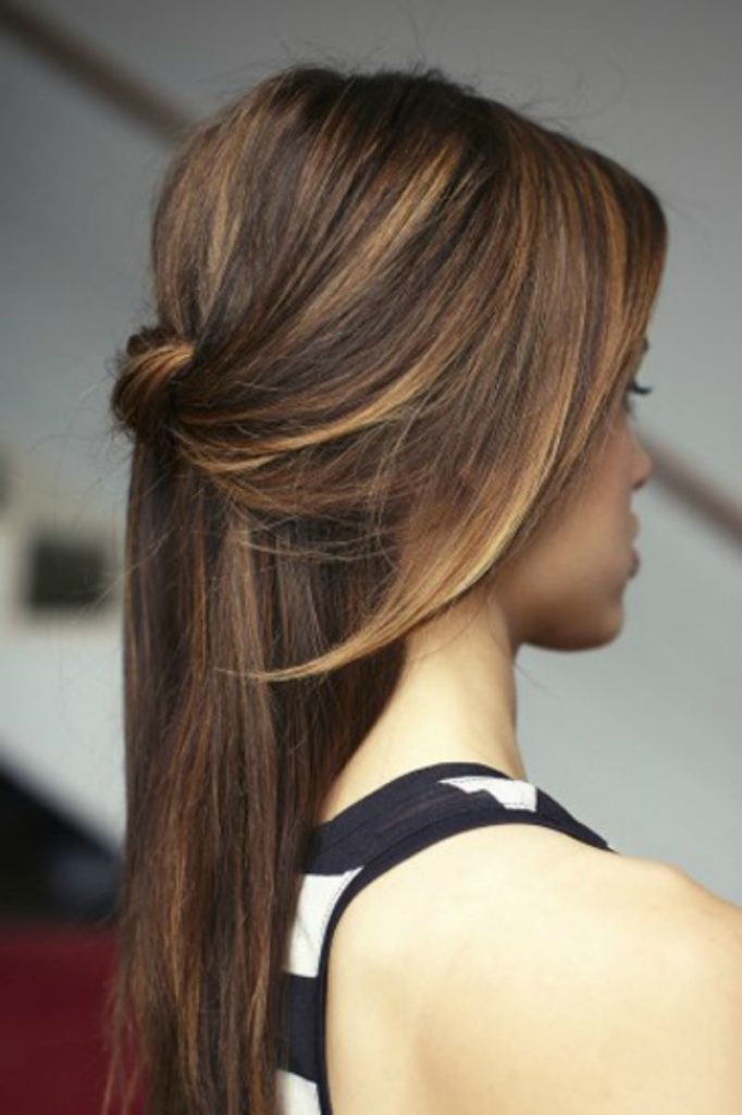 One side pinned back semi open hairstyle