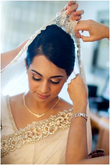 A neat bouffant for christian wedding in saree