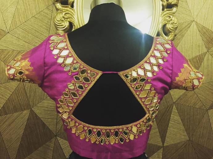 Boat neck blouse design with mirror work