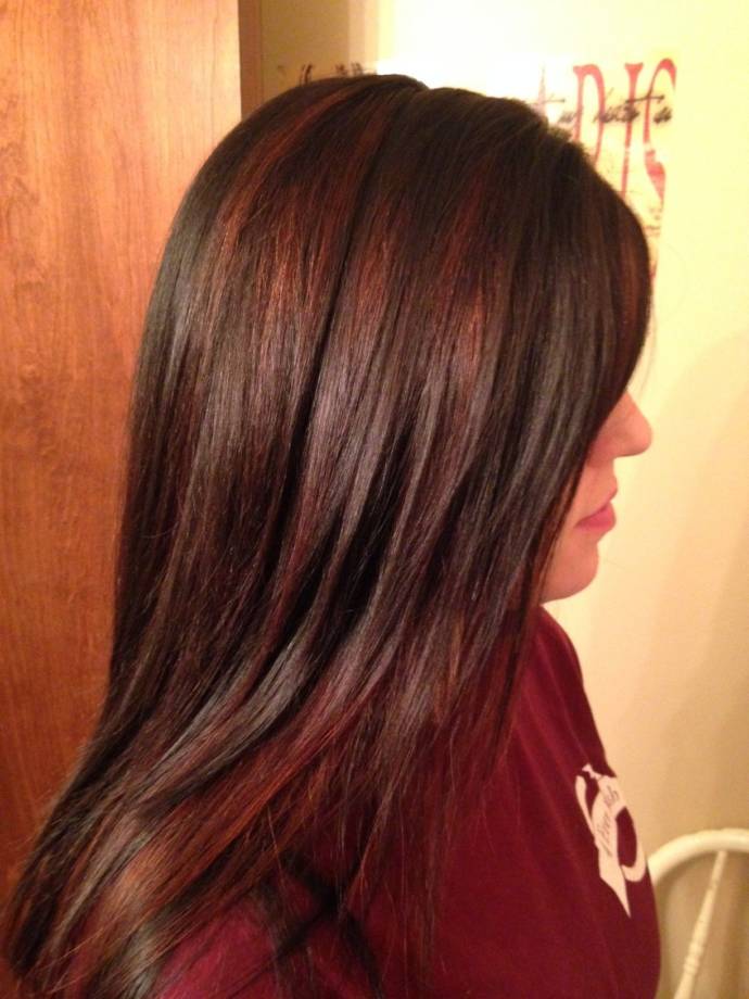 Dark hair color with reddish highlight