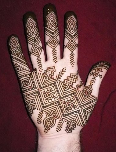 Geometric pattern henna on palms