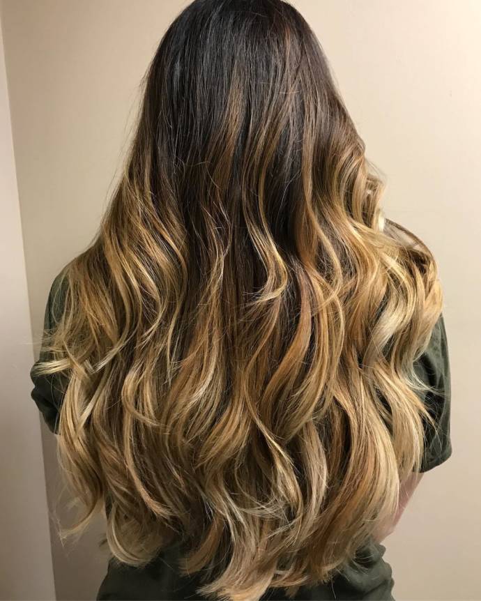 Layered hairstyle with brown blonde hair