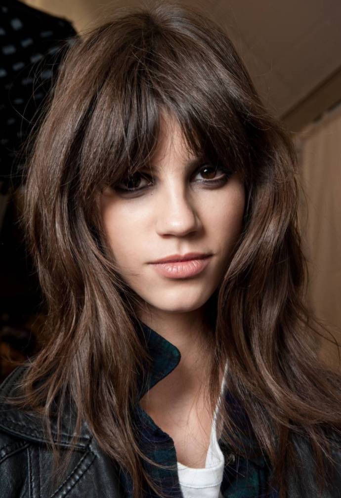 Light brown and black hair with middle part fringe hairstyle