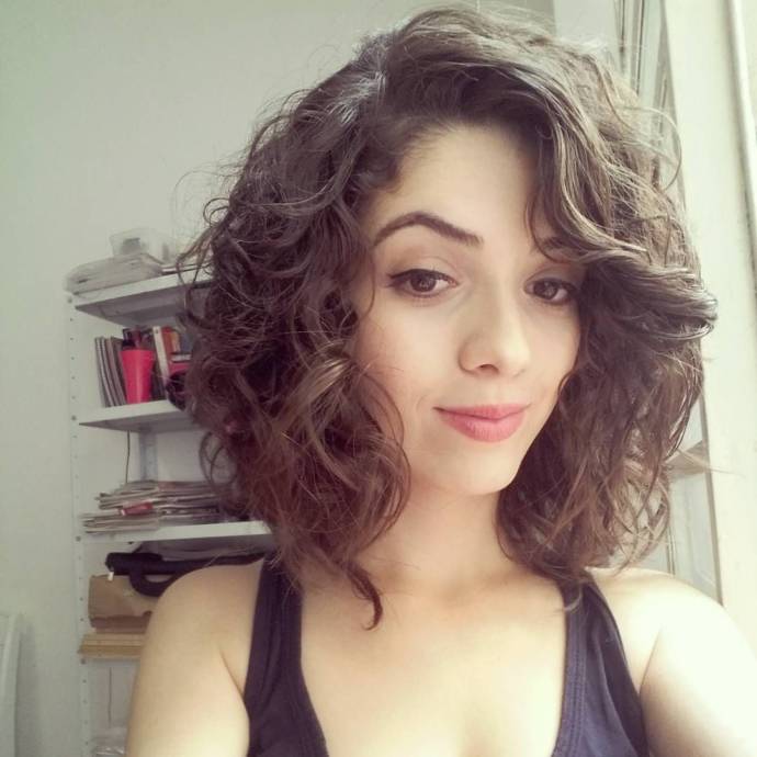 Long wavy bob hairstyle with frizzy/curly hair