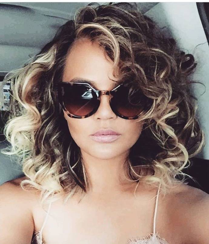 Short curls with blonde highlights