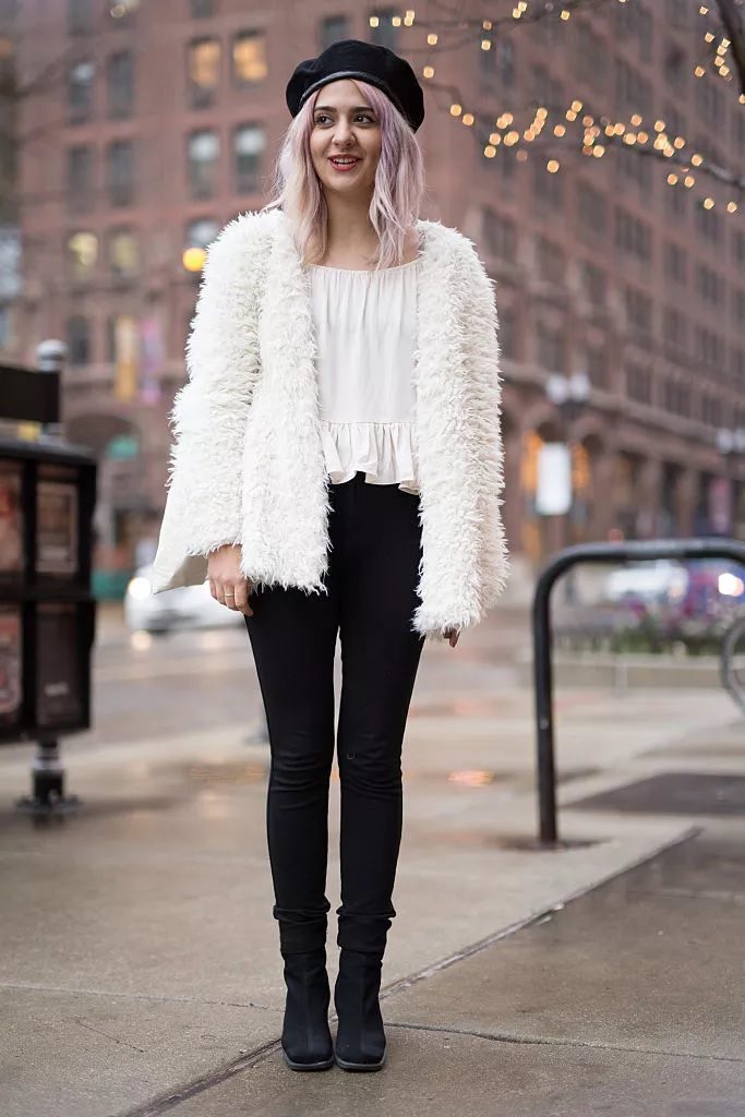 White faux fur with skinny black jeans
