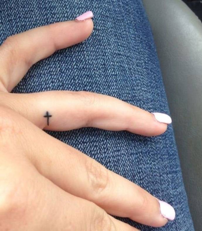 cross finger tattoos