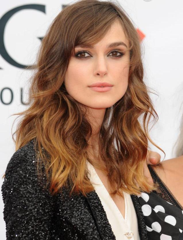 Wavy and curly side fringe hairstyle