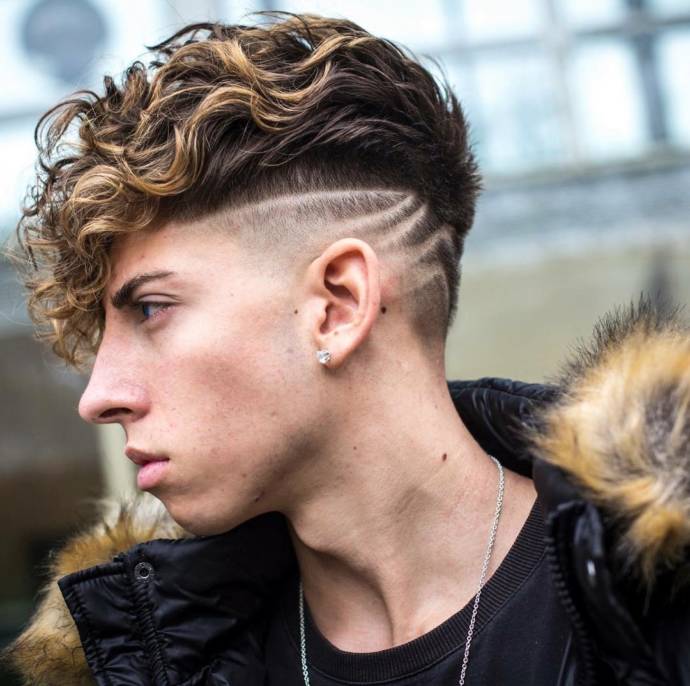 High skin fade with curly fringe